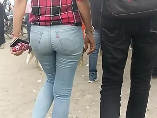 Sexy Indian round arse girl walking apropos public